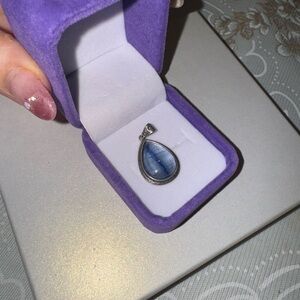 Kyanite teardrop pendant in 925 silver setting